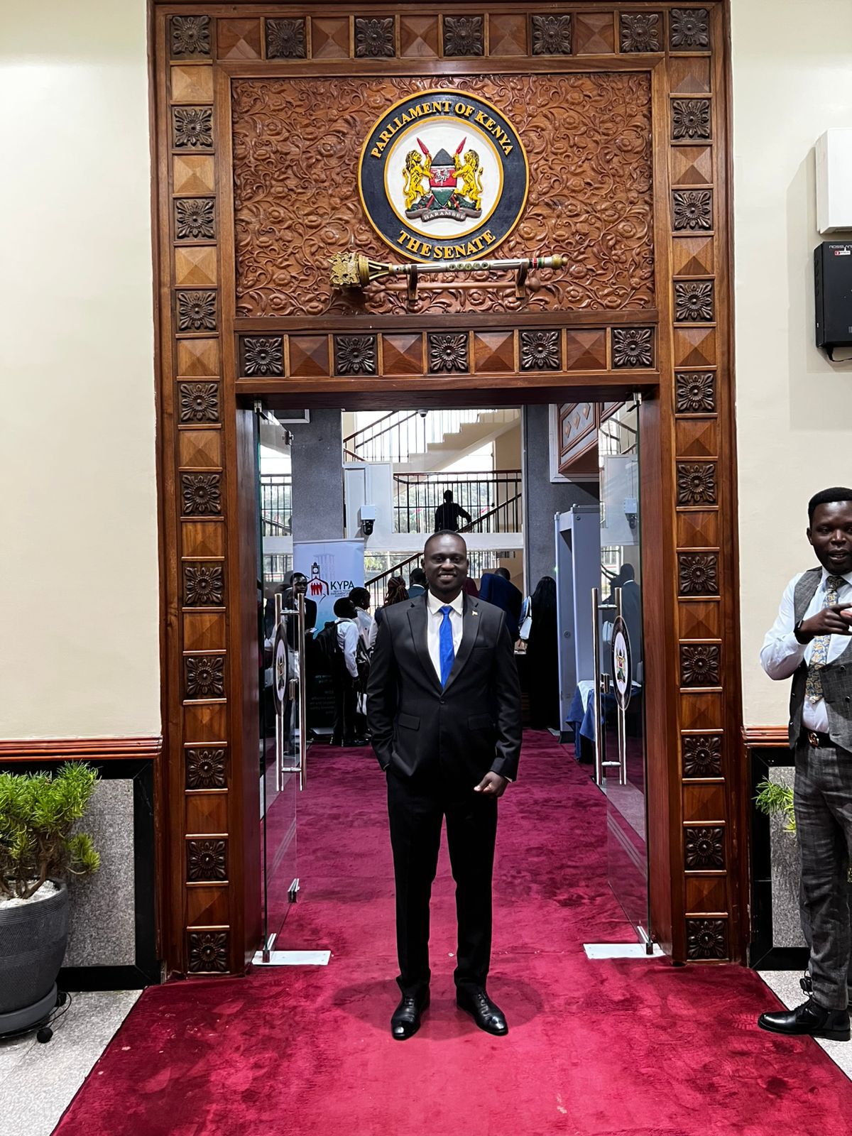 Levi Mulase at Parliament of Kenya entrance
